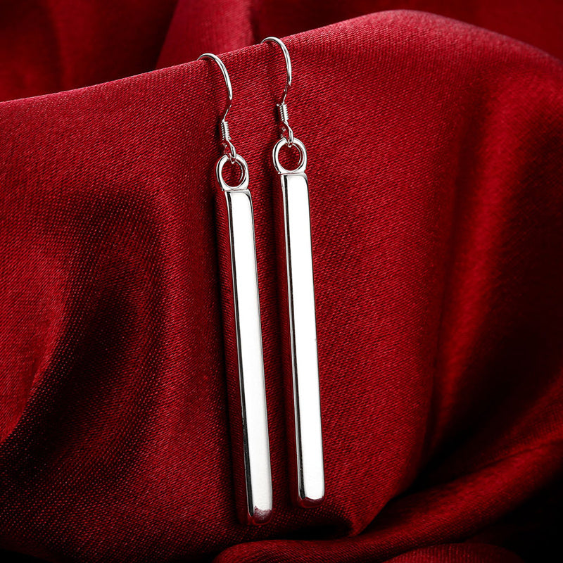 Elegant women's sterling silver line dangle earrings, perfect minimalist jewelry for everyday wear or special occasions.