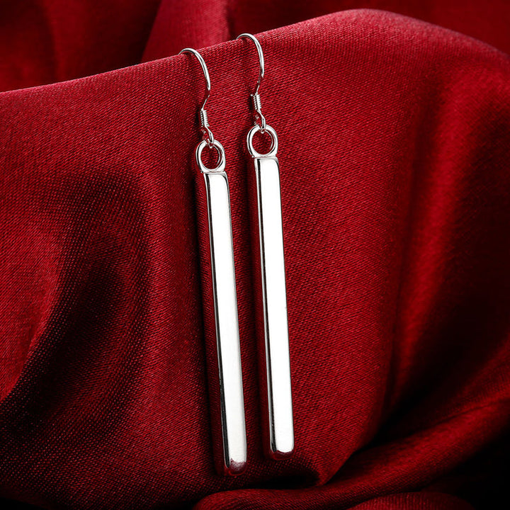 Elegant women's sterling silver line dangle earrings, perfect minimalist jewelry for everyday wear or special occasions.