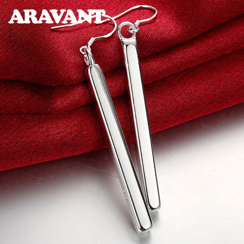 Sterling silver hypoallergenic line earrings, an elegant gift for her, featuring a modern, sleek dangle design.