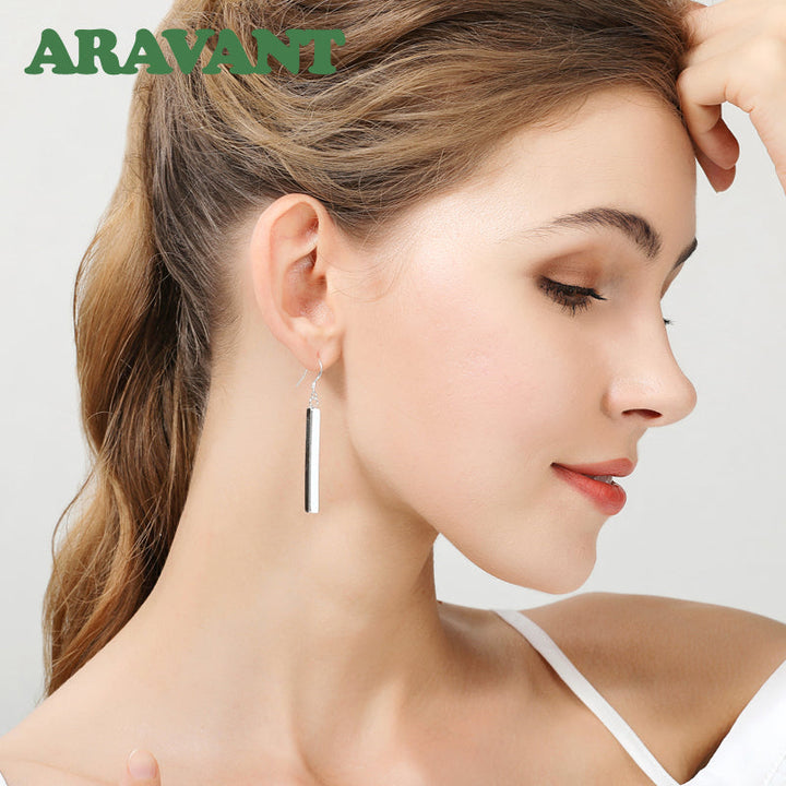 Delicate sterling silver line dangle earrings for women, elegant and minimalist, a timeless jewelry piece.