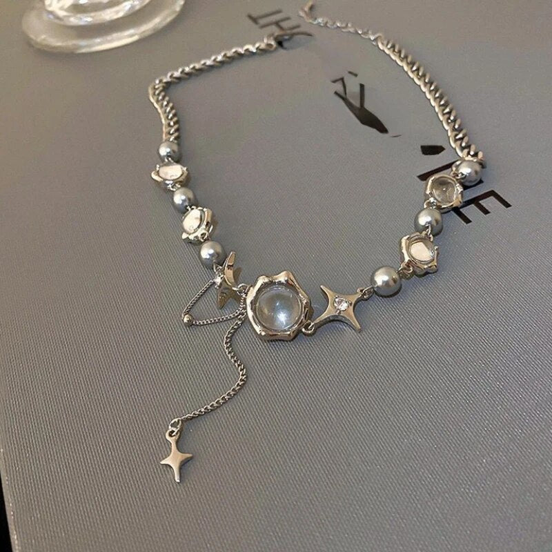 Elegant women's sterling silver necklace with a refined chain and sparkling star crystal design.