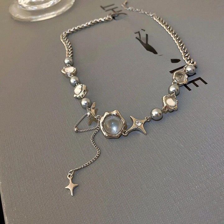 Elegant women's sterling silver necklace with a refined chain and sparkling star crystal design.
