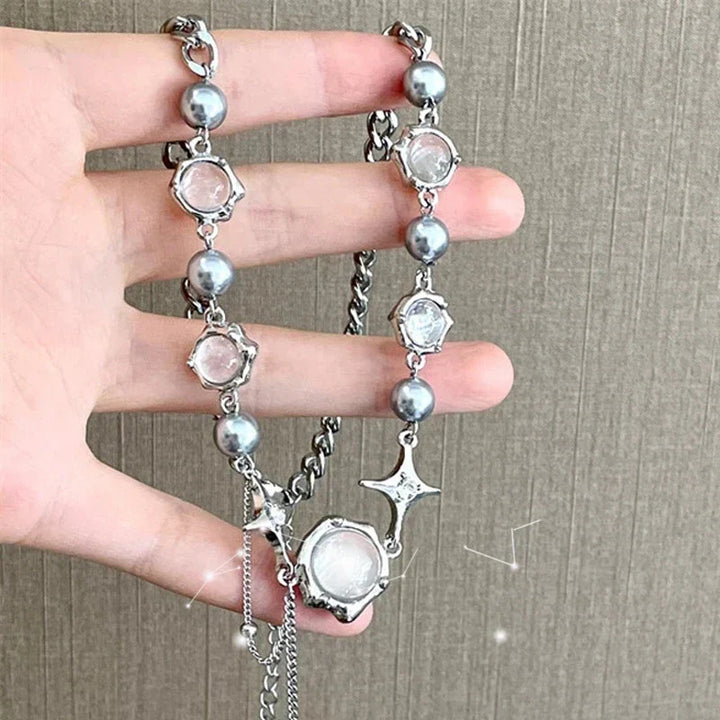 Close-up of a celestial-inspired star crystal chain necklace for women, made from sterling silver.