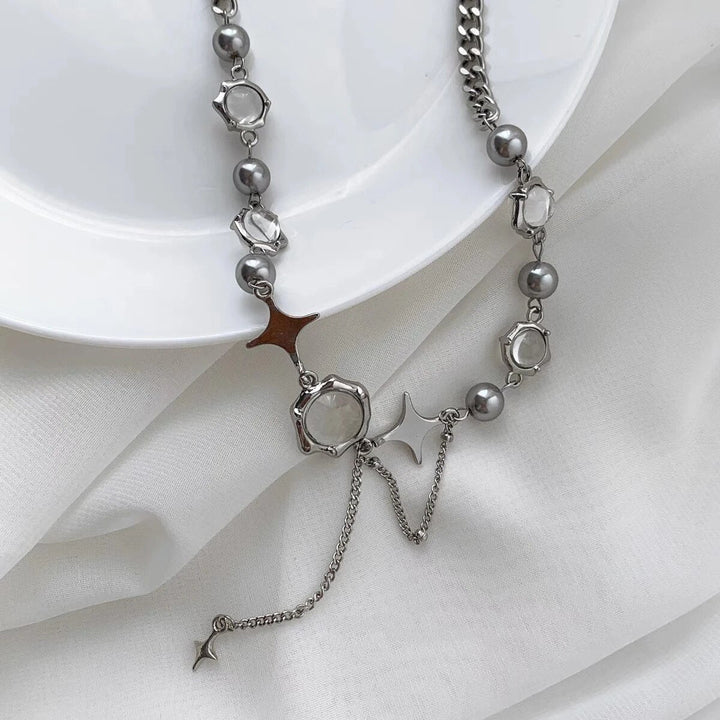 Dainty sterling silver necklace for women, featuring a refined chain and delicate star crystal accents.