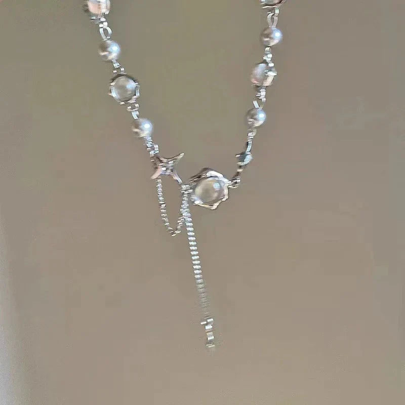 Fashionable women's jewelry: an elegant sterling silver necklace with a sparkling star crystal chain.
