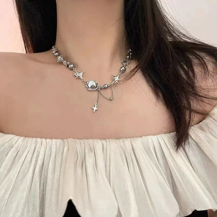 Refined women's necklace crafted from sterling silver, adorned with a shimmering star crystal chain.