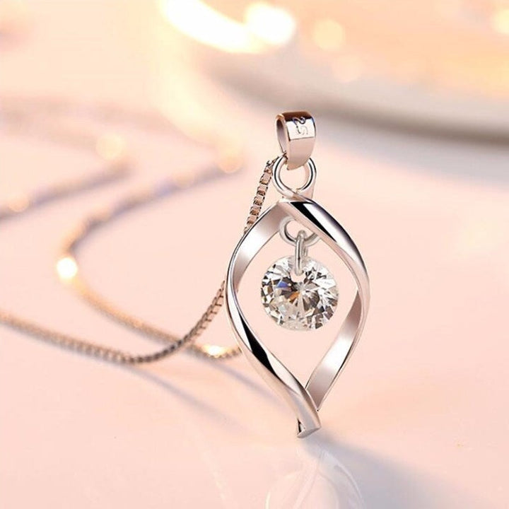 Elegant women's sterling silver necklace with sparkling zirconia crystal pendant, perfect for any occasion or gift.