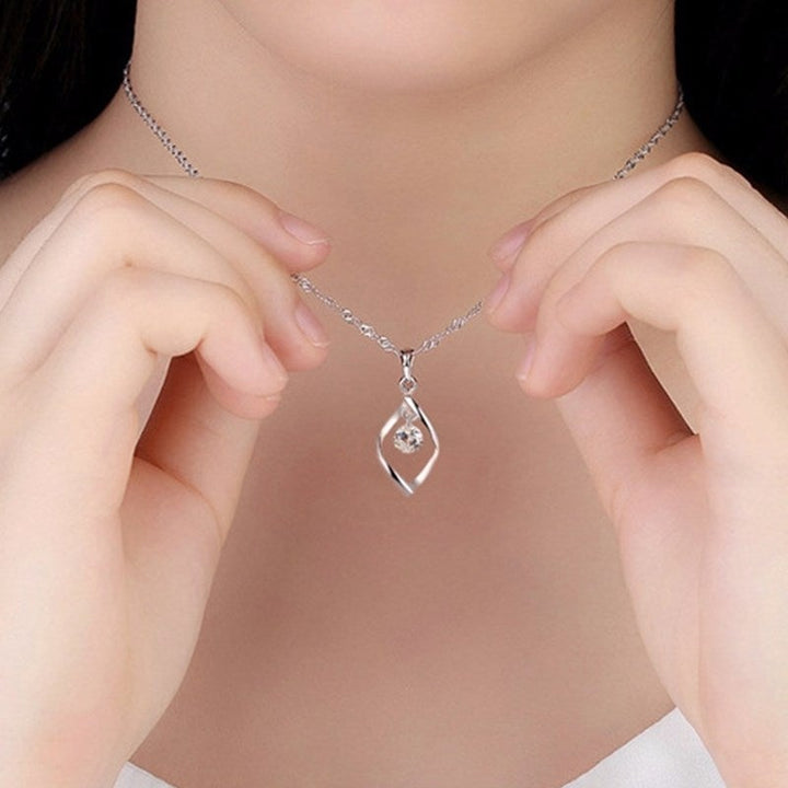 Sparkling zirconia crystal pendant on a sterling silver necklace, an elegant and timeless piece of women's jewelry.
