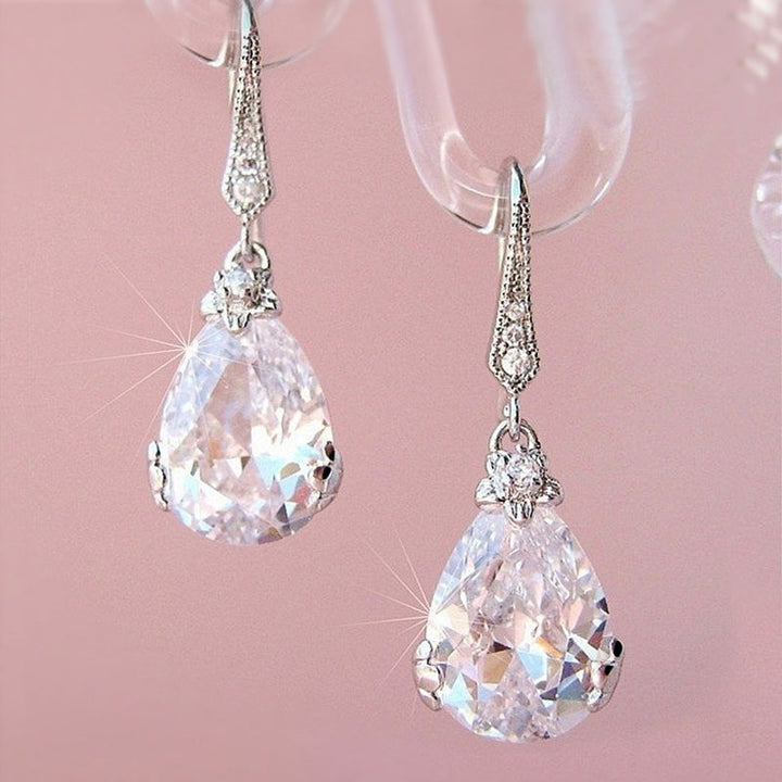 Sparkling rhinestone pear drop earrings in sterling silver, an elegant and classic design for women.