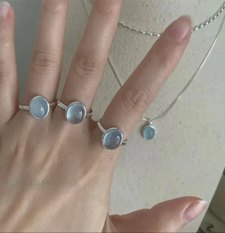 Natural aquamarine sterling silver ring for women, a symbolic and elegant blue gemstone jewelry piece.