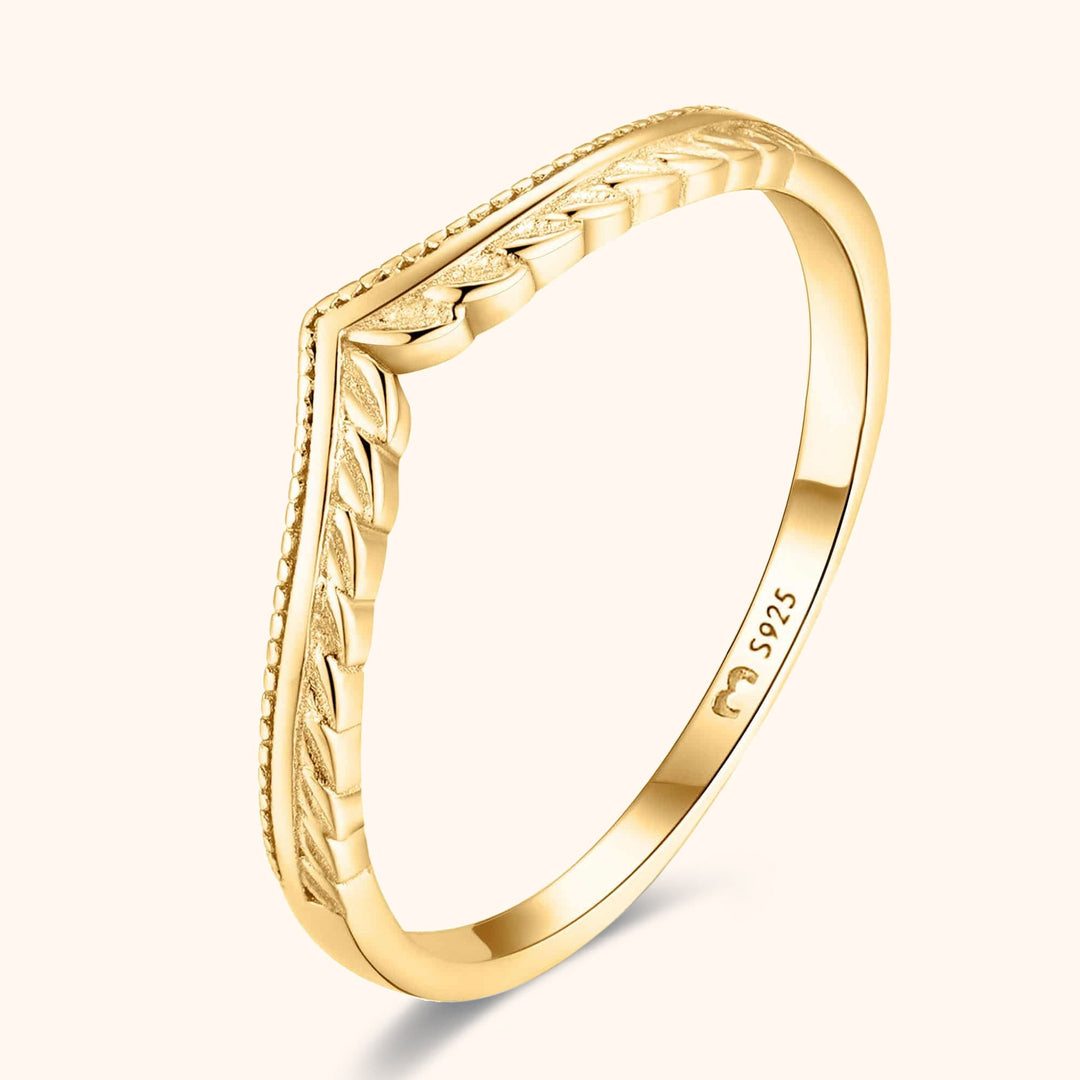 Elegant women's sterling silver ring with delicate leaf pattern. Nature-inspired fashion jewelry, perfect gift.