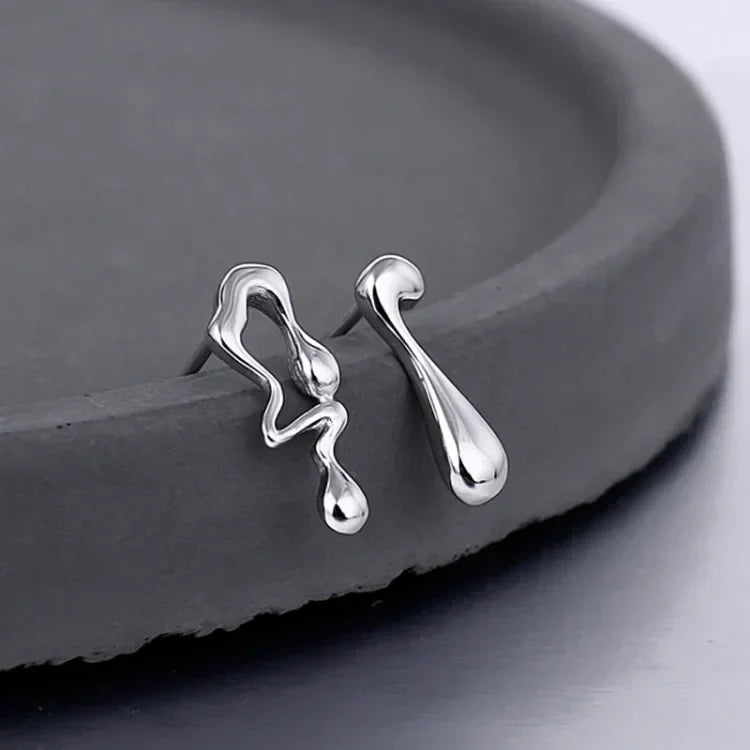Stylish water droplet earrings for women, featuring a modern and elegant sterling silver design. Hypoallergenic jewelry.