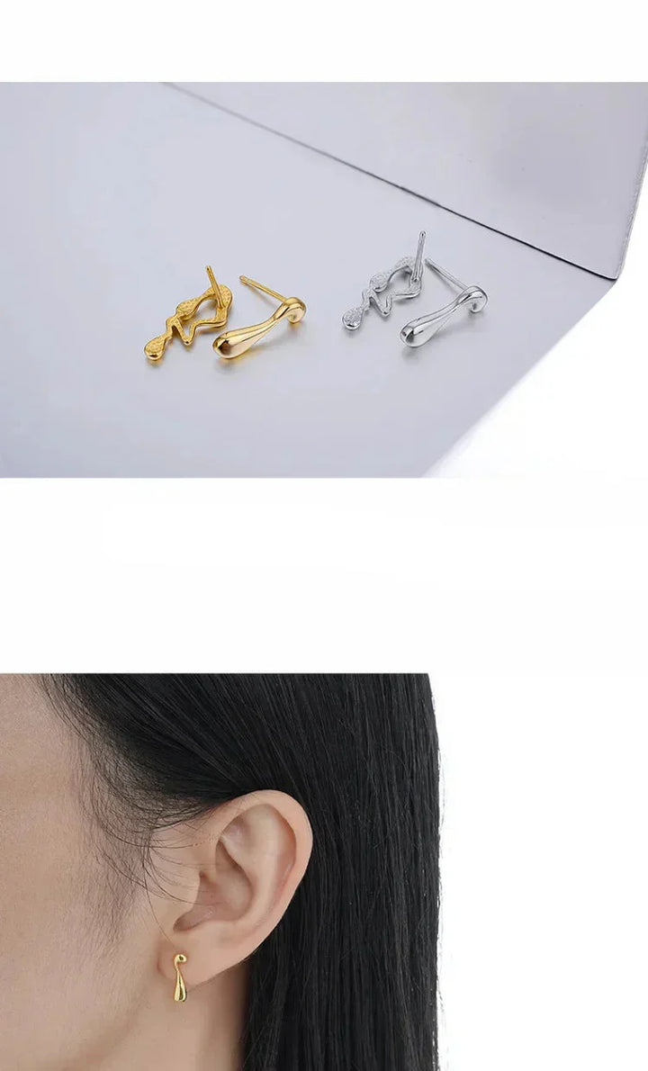 Sophisticated women's water droplet earrings. Hypoallergenic, sterling silver elegant jewelry with a contemporary design.