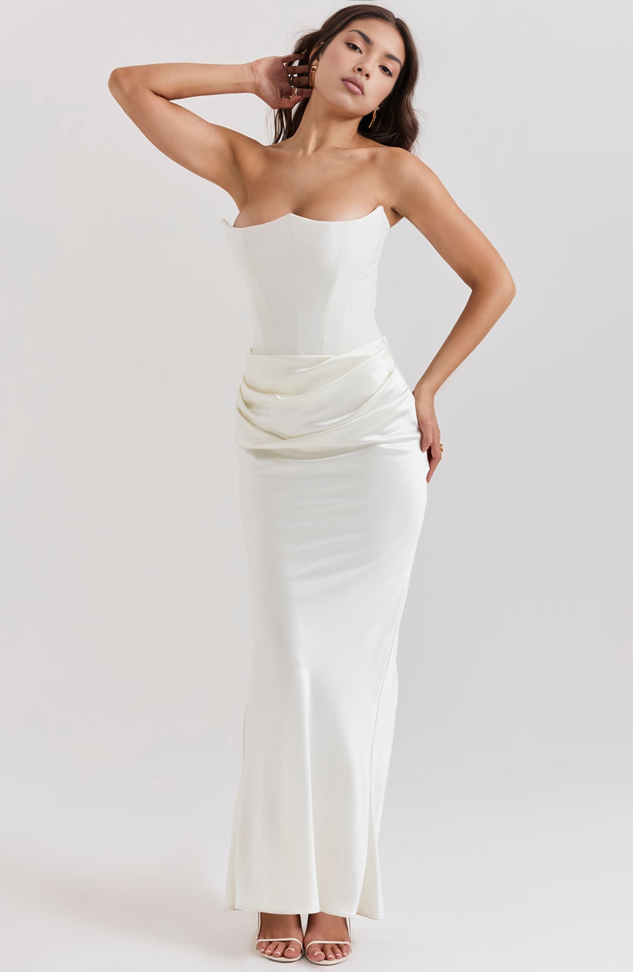 Sleek silhouette women's strapless maxi dress with corset, perfect as an elegant formal evening gown.