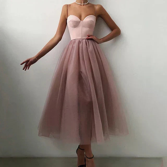 Glamorous white strapless evening dress for women, a formal maxi gown with a pleated skirt, perfect for elegant events.