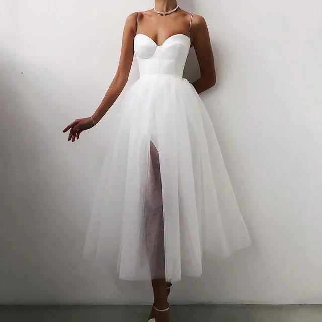 Chic strapless women's party dress, an elegant evening gown for special occasions with a flattering pleated maxi skirt.
