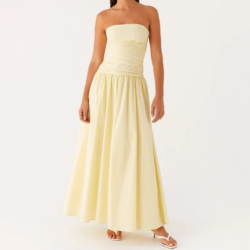 Classic women's strapless maxi dress, elegant summer evening wear, perfect for resort vacations.