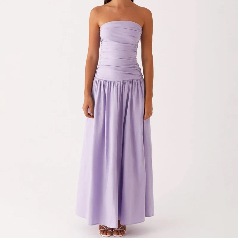 Sleek women's strapless maxi dress, floor-length & elegant, ideal for summer evening events.