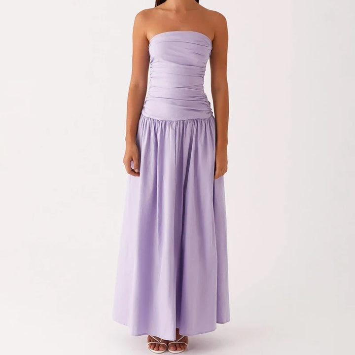 Sleek women's strapless maxi dress, floor-length & elegant, ideal for summer evening events.
