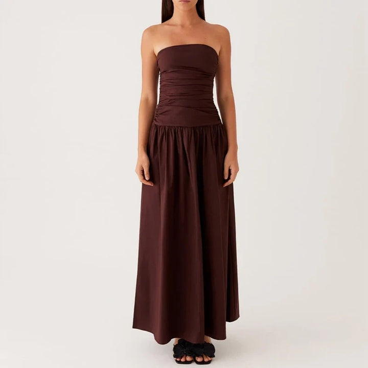 Beautiful women's strapless maxi dress, elegant and breezy for summer evening festivities.