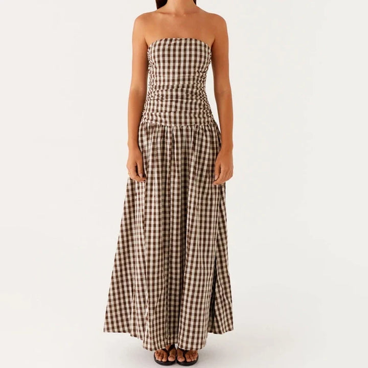 Luxurious women's strapless maxi dress, perfect for upscale summer evening events & resort holidays.