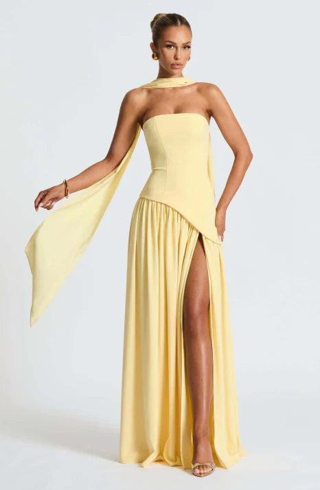 Stunning strapless maxi formal dress for women. This elegant flowing gown is perfect as a long party or evening dress.