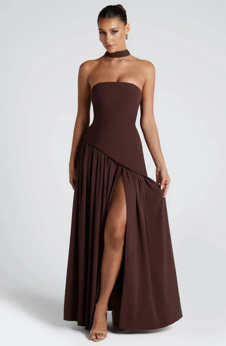 Chic women's strapless formal maxi dress. This elegant flowing gown is a perfect choice for any special occasion or party.
