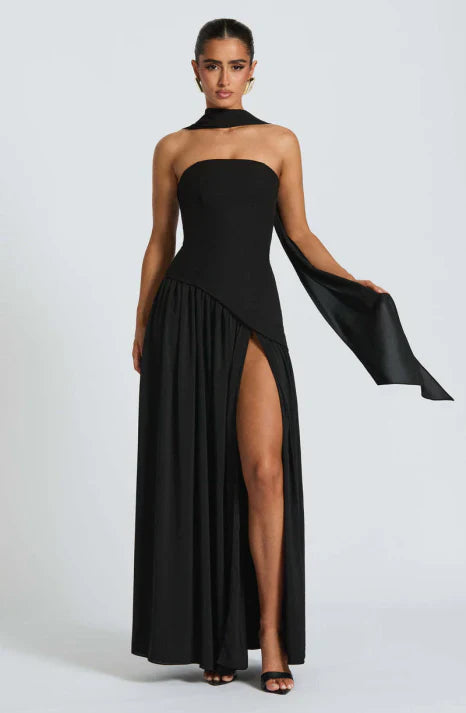 Sophisticated women's strapless maxi formal gown. Elegant, flowing, and long, a perfect evening or special occasion dress.