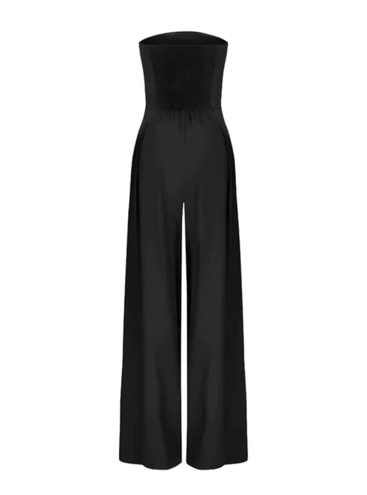 Modern navy blue wide-leg strapless jumpsuit for women, a chic party outfit for sophisticated occasions.