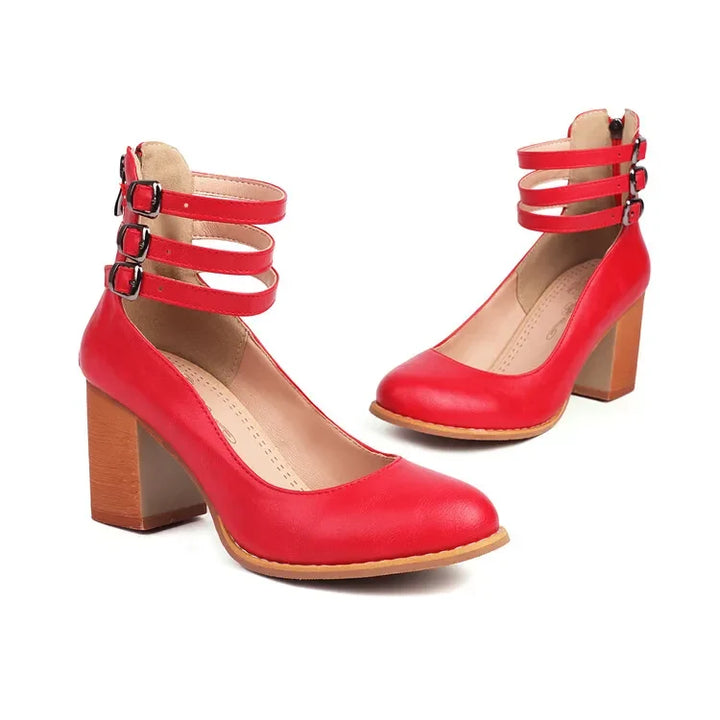 Eye-catching women's statement heels: strappy design and comfortable block for a stylish look.