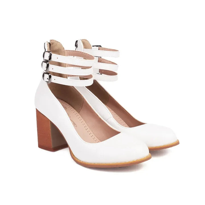 Women's elegant ankle-strap block heels, offering a perfect blend of modern style and comfort.