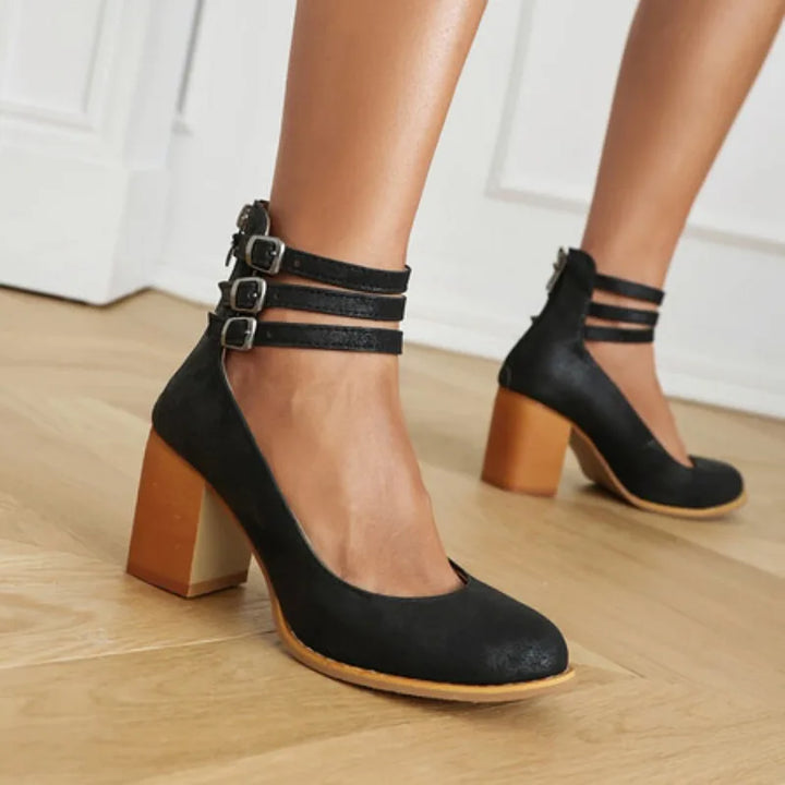 Comfortable women's block heel sandals with intricate strappy details, great for elegant fashion.