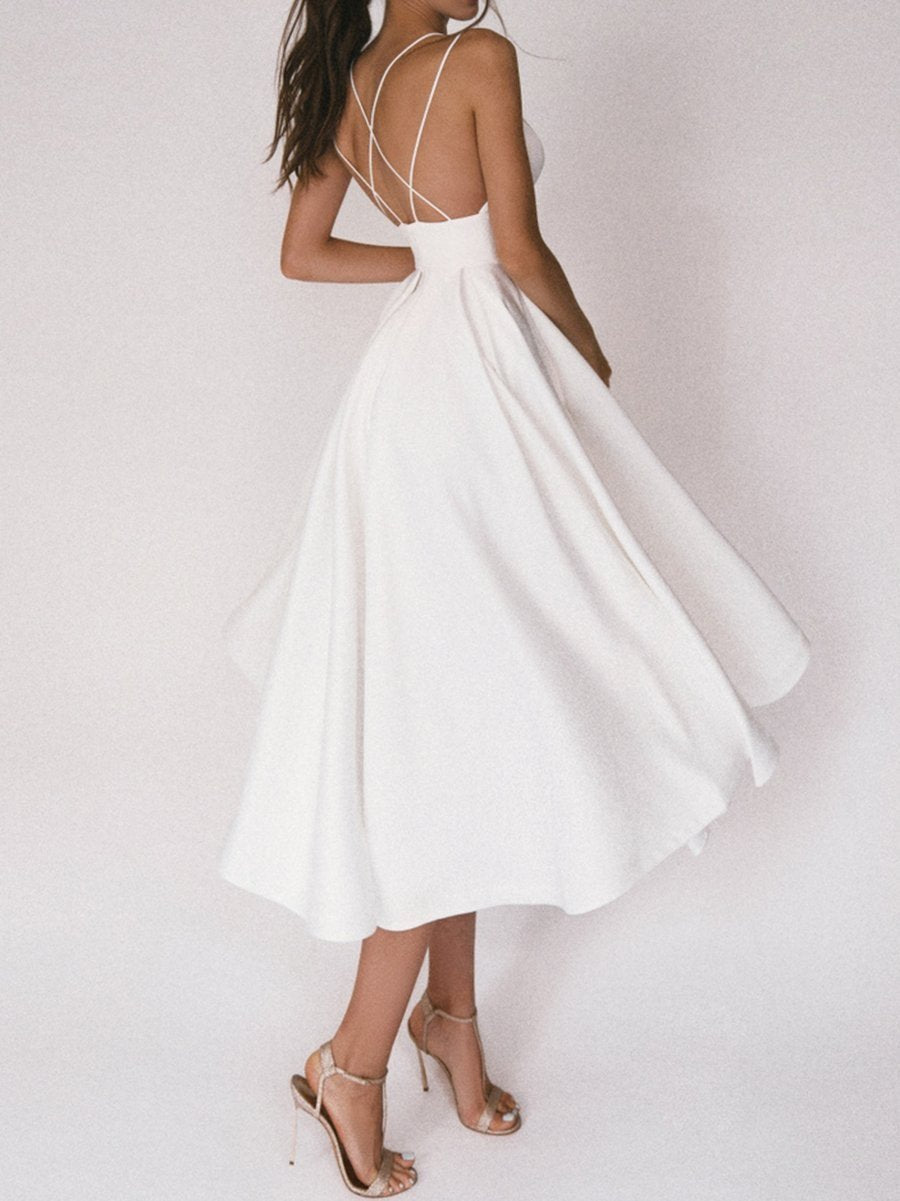 Chic strappy V-neck midi dress for women, ideal for cocktail parties & elegant events.