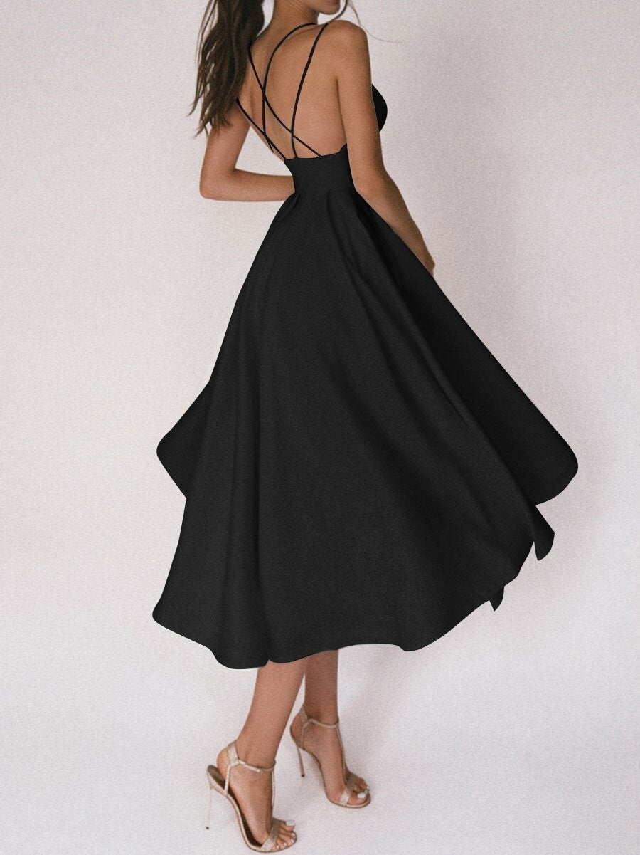 Strappy V-neck women's midi dress with a flattering silhouette, great for summer occasion wear.