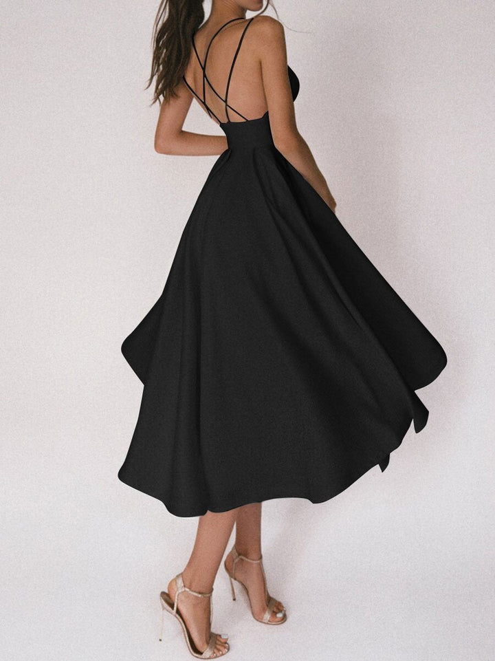 Strappy V-neck women's midi dress with a flattering silhouette, great for summer occasion wear.