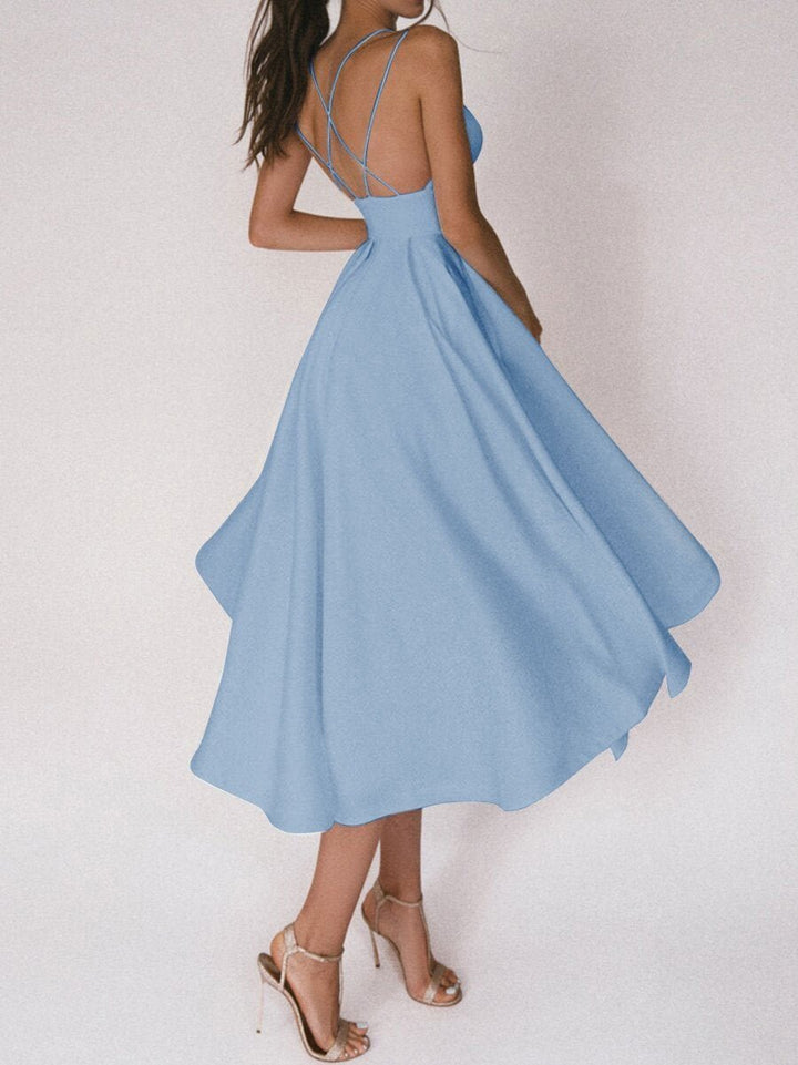 Graceful V-neck midi dress for women, with delicate straps, perfect for elegant summer gatherings.