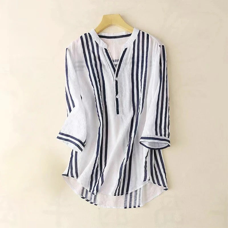 Elegant women's striped button-up shirt, perfect for business casual or stylish everyday wear. Comfortable long sleeve blouse.