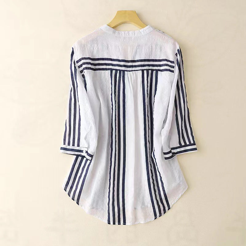 Classic versatile women's long sleeve striped button-up shirt, ideal for a sophisticated business casual look.
