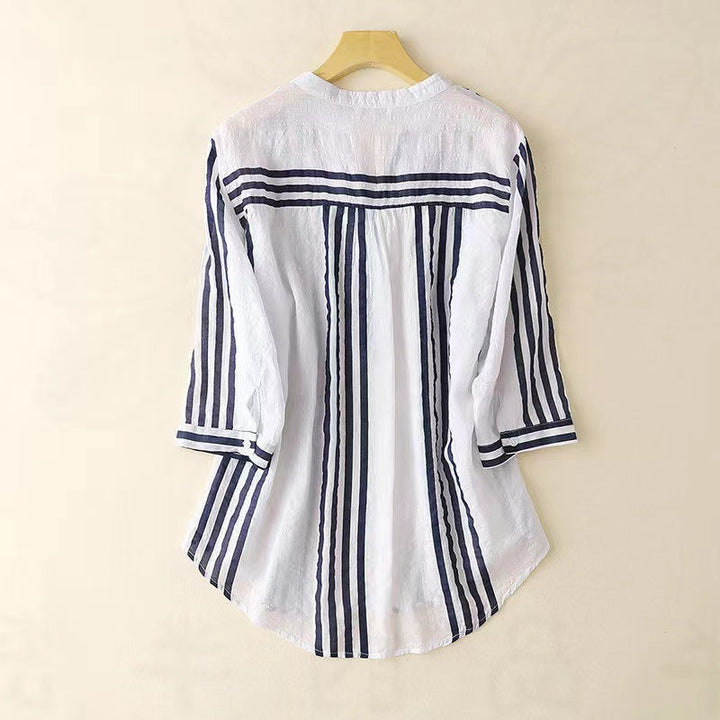 Classic versatile women's long sleeve striped button-up shirt, ideal for a sophisticated business casual look.