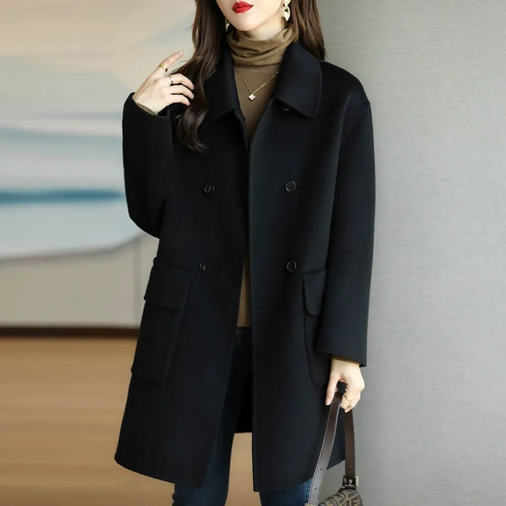 Sophisticated women's long coat, structured and elegant, ideal for fall and winter classic style.