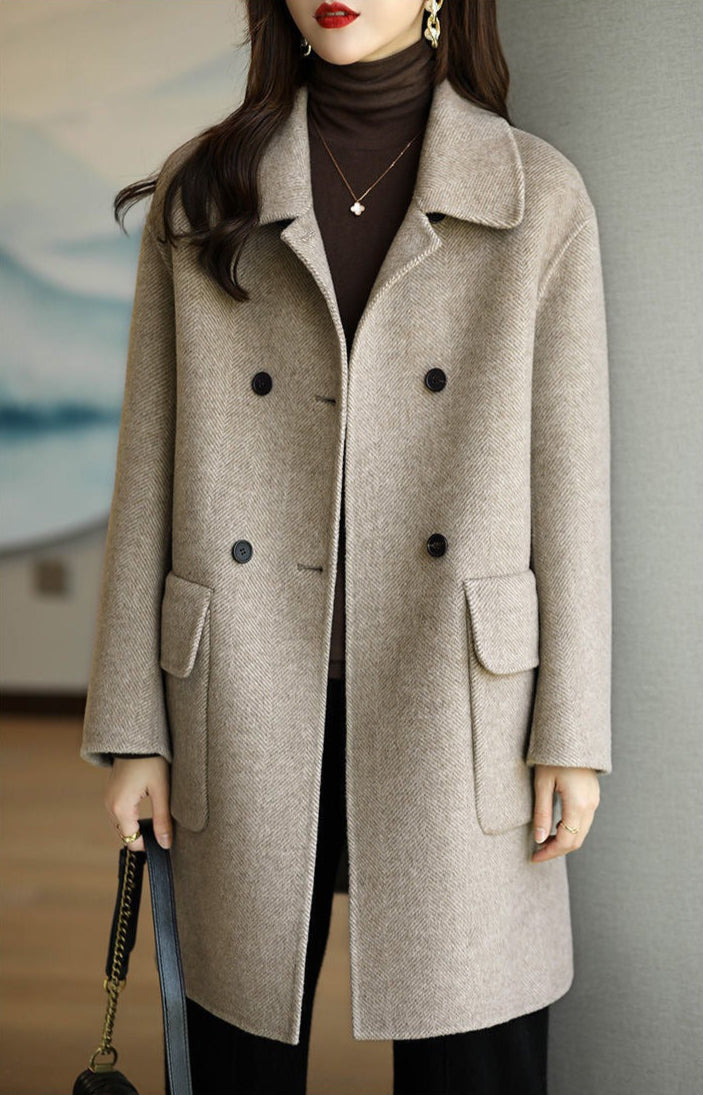 Chic women's long structured coat, perfect elegant outerwear for chilly fall and winter seasons.