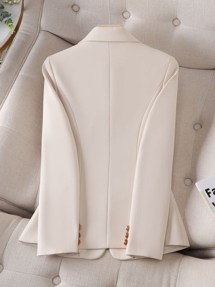Versatile women's tailored blazer for professional office wear & smart casual outfits. Structured fit, single button closure.