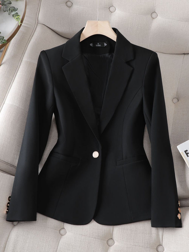 Chic women's structured blazer with single button. Ideal tailored jacket for elegant workwear or stylish casual fashion.