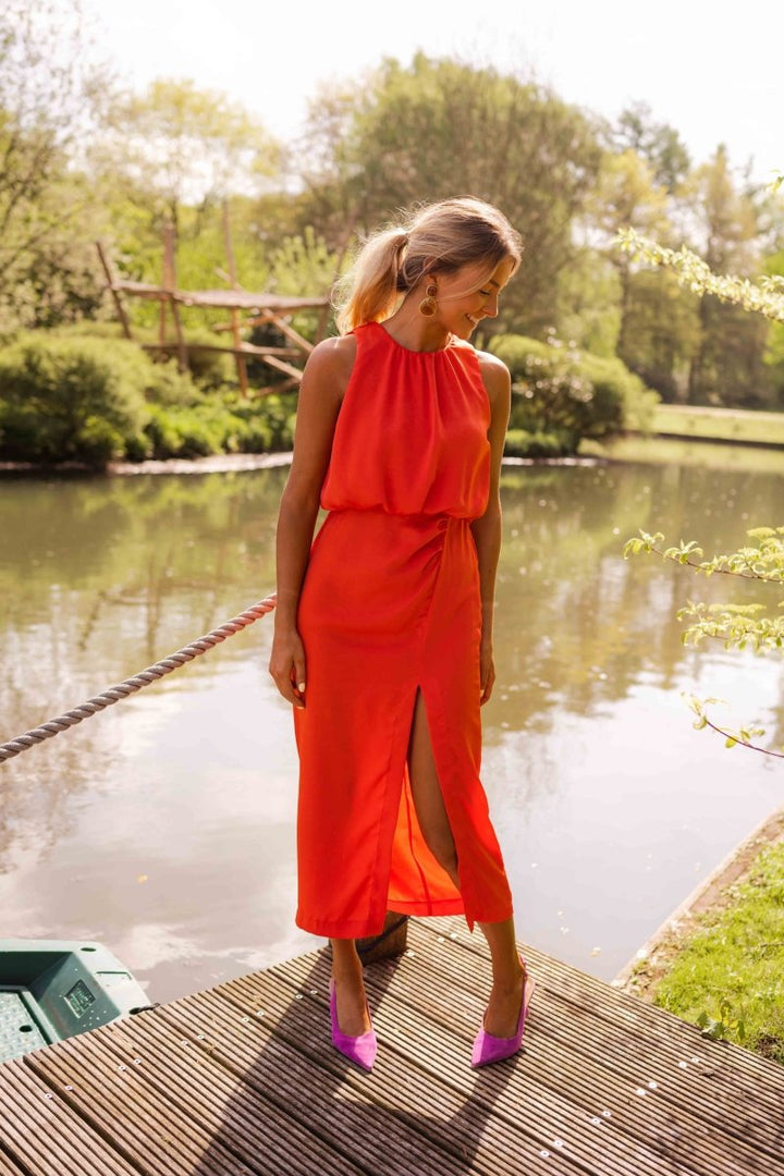 Comfortable sleeveless midi dress, a chic women's summer fashion piece with a flowing design for any occasion.