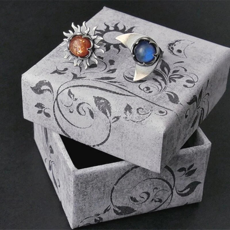 Women's sun and moon celestial drop earrings, elegant symbolic jewelry for a stylish accessory choice.