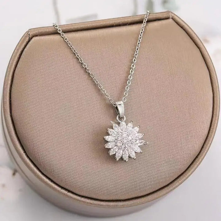 Rose gold sunflower spin duo necklace for women, elegant rotating pendant with an adjustable chain, fashion jewelry.