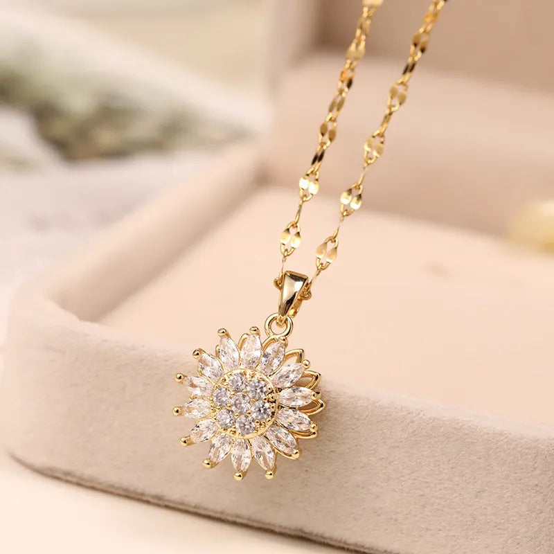 Beautiful spinning sunflower pendant necklace, a unique gift for her. Elegant women's fashion jewelry with an adjustable chain.