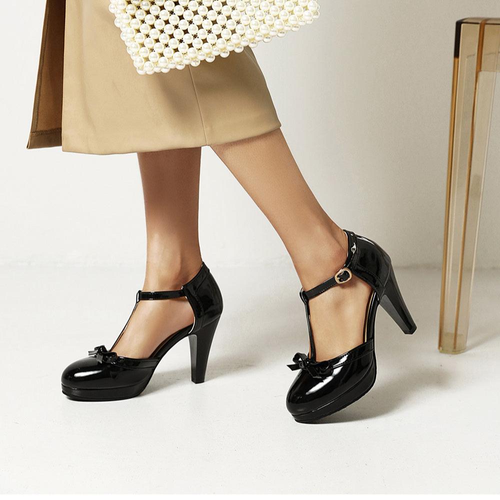 Comfortable women's T-strap block heels with elegant bow detail, perfect dress shoes for formal footwear.