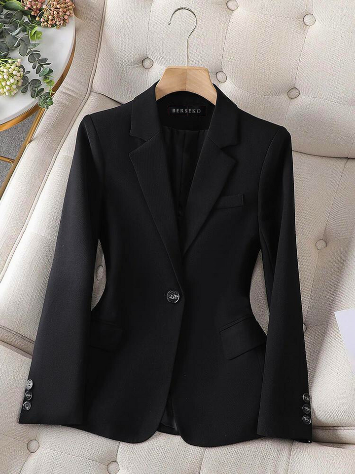 Sleek tailored women's blazer for a professional look. Ideal for business meetings & formal wear.