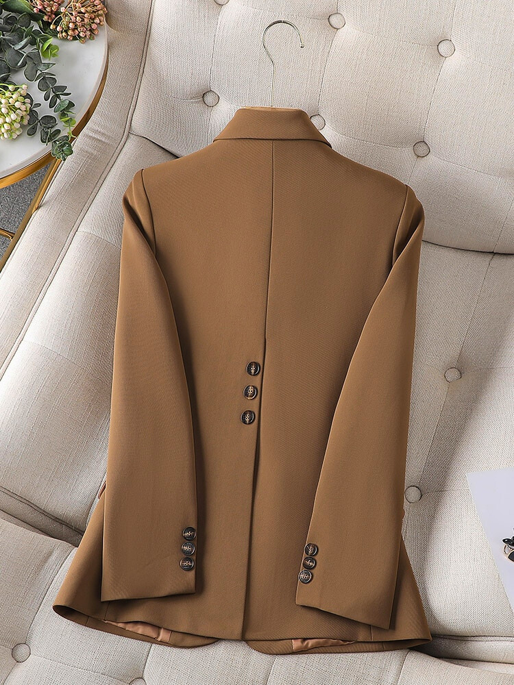 Chic women's tailored blazer for professional style. Elevate your business attire and workwear.